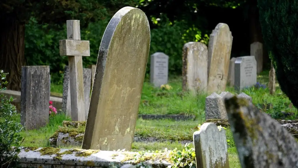Gravestones with moss in an old cemetery. 
